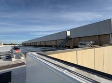 Sound-dampening curtain along Building 3